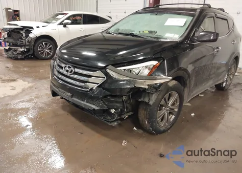 2014 Hyundai Santa Fe Sport 2.4L z USA, uszkodzony, nr VIN 5XYZUDLB2EG155876